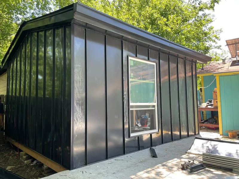 Black standing seam metal wall panels for Metal Roof Installation in Zeeland